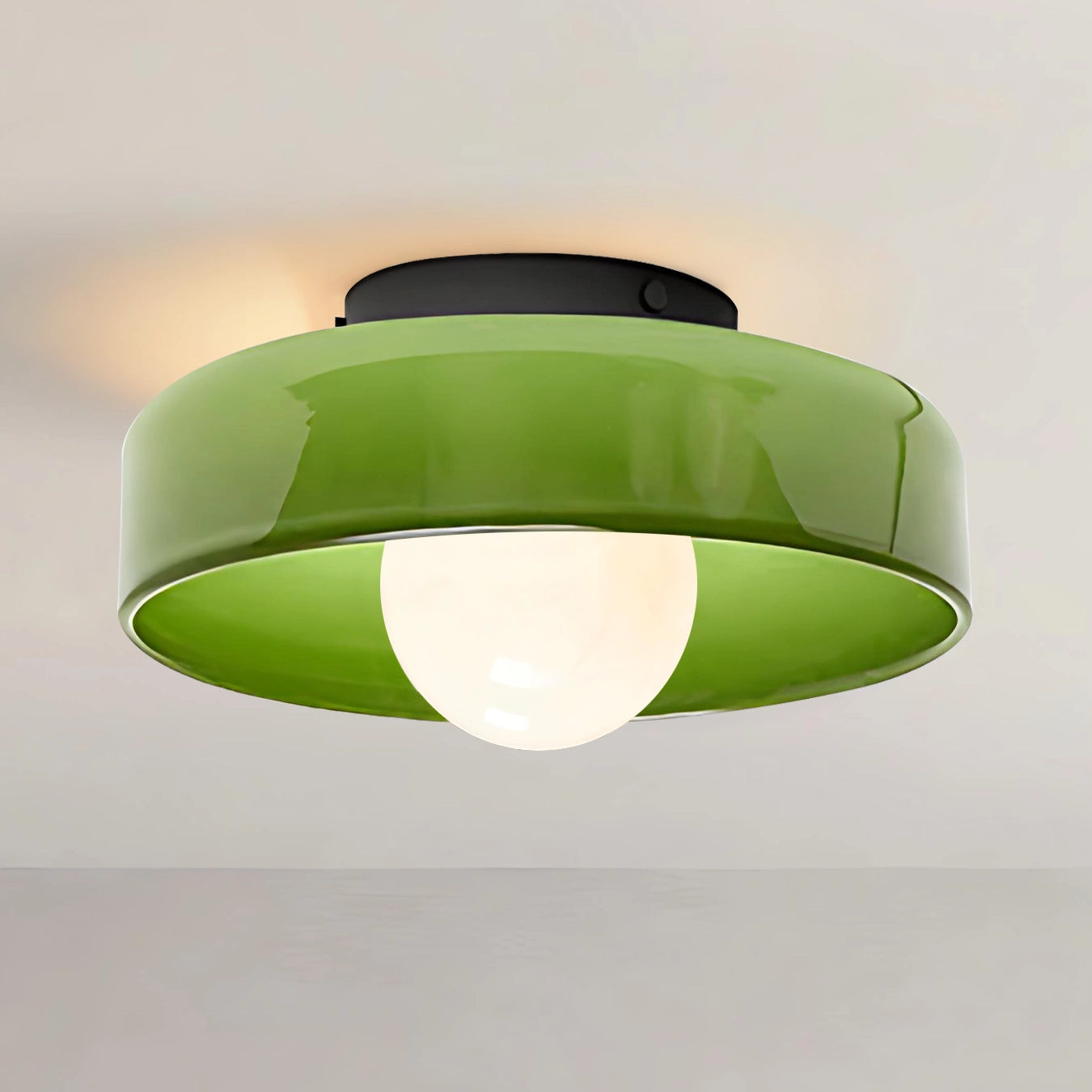 Green ceiling light fixture on a neutral background