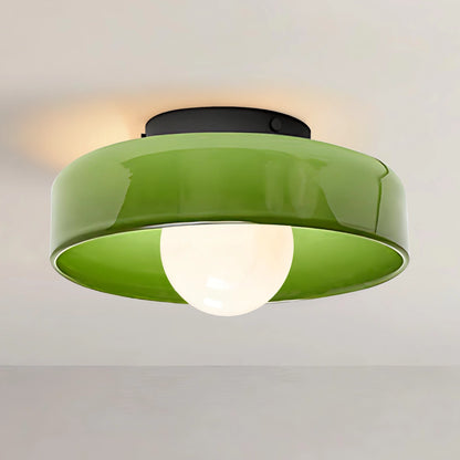 Green ceiling light fixture on a neutral background